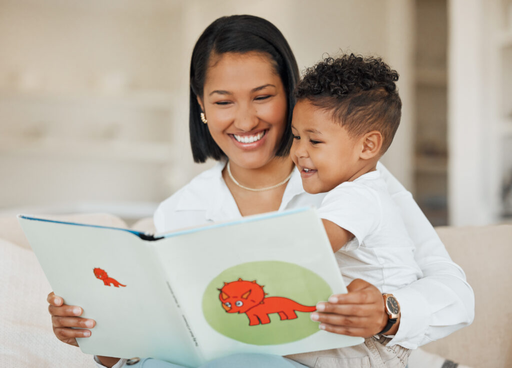 Mother reading with young son