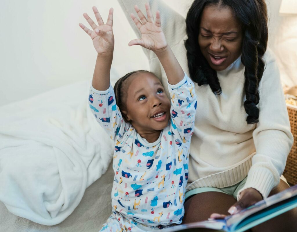 mom reading to son at bedtime