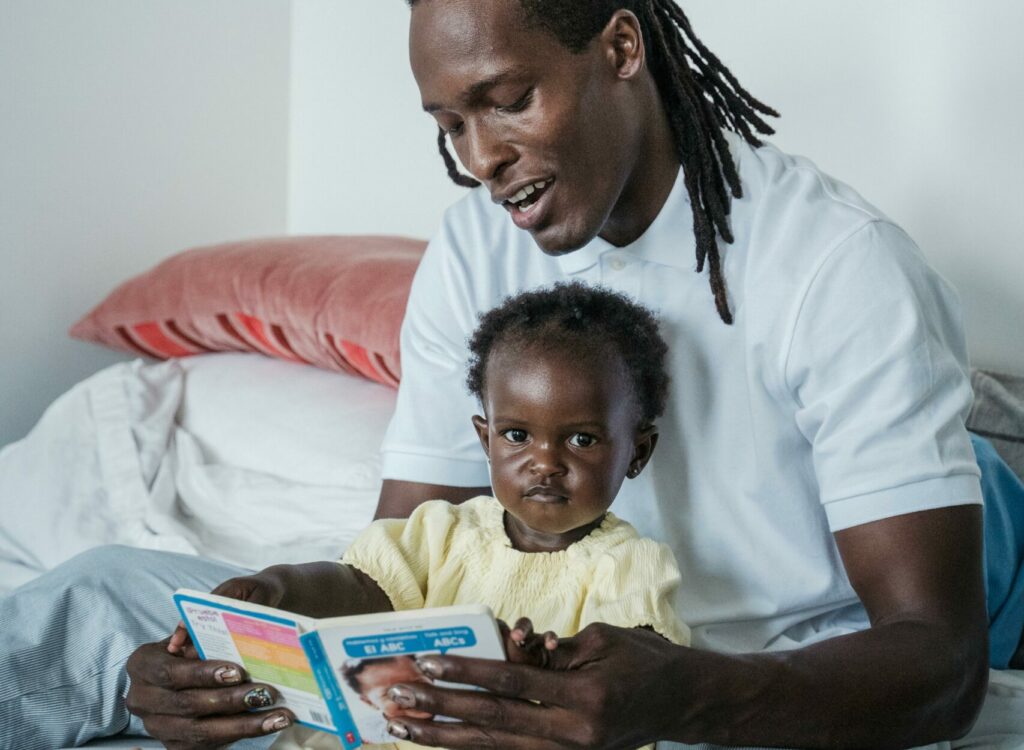 Dad reading to toddler